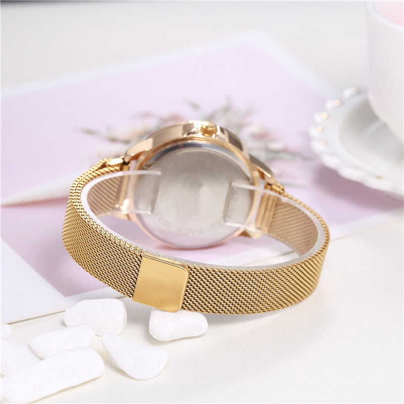 Time to run ladies magnet buckle quartz