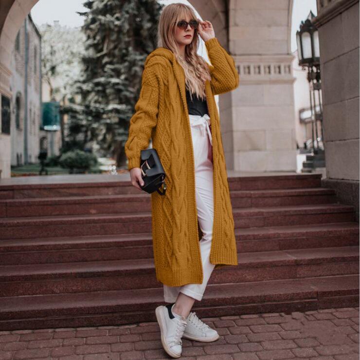 A hooded long cardigan sweater